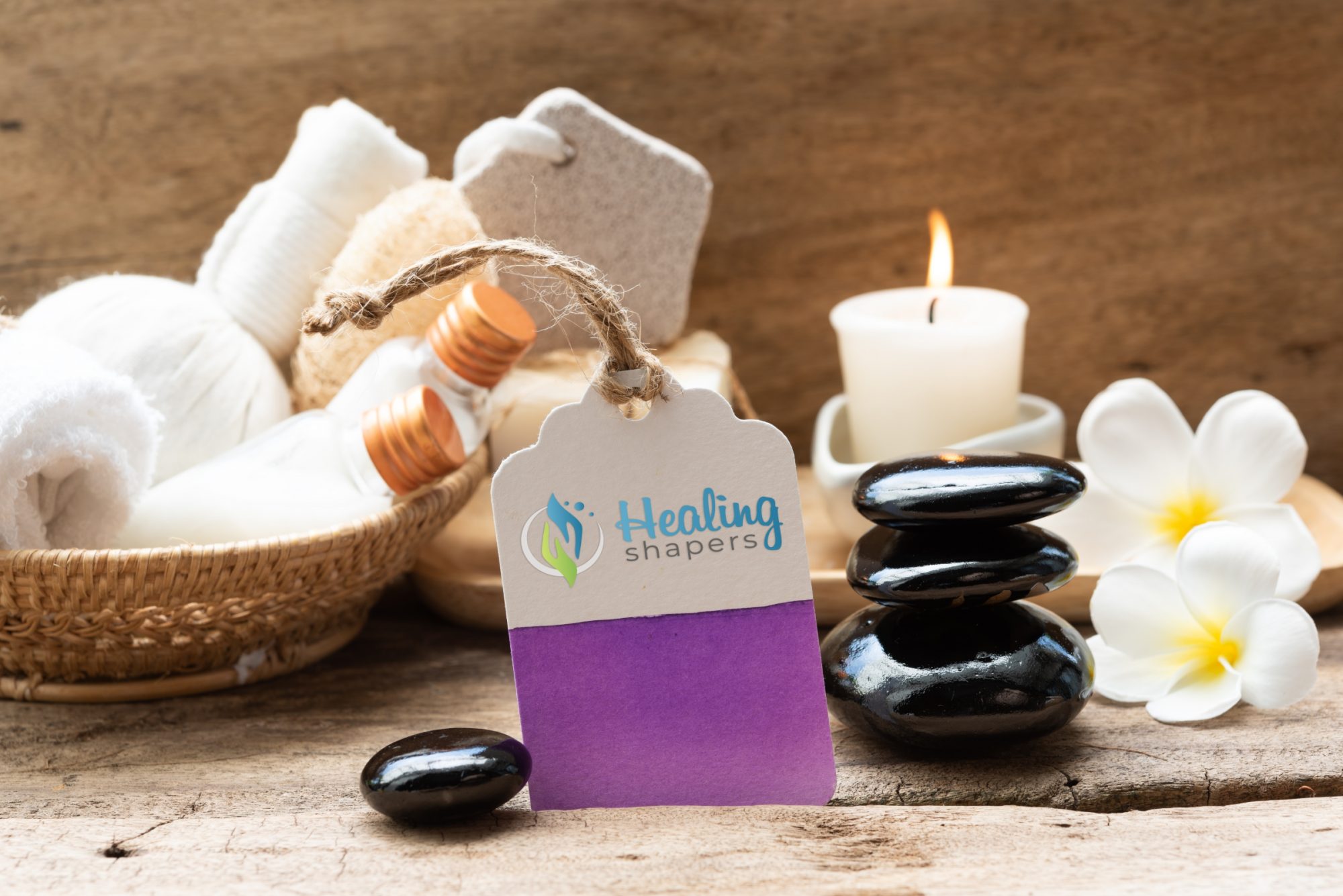 stock photo spa wellness products black zen stone with price tag branding for promotion on wood table 1279032526 2jpg